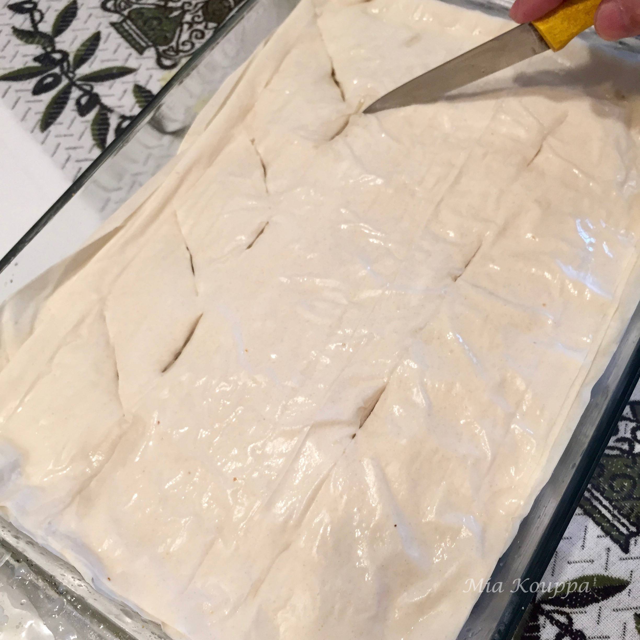 Scoring the phyllo dough before baking