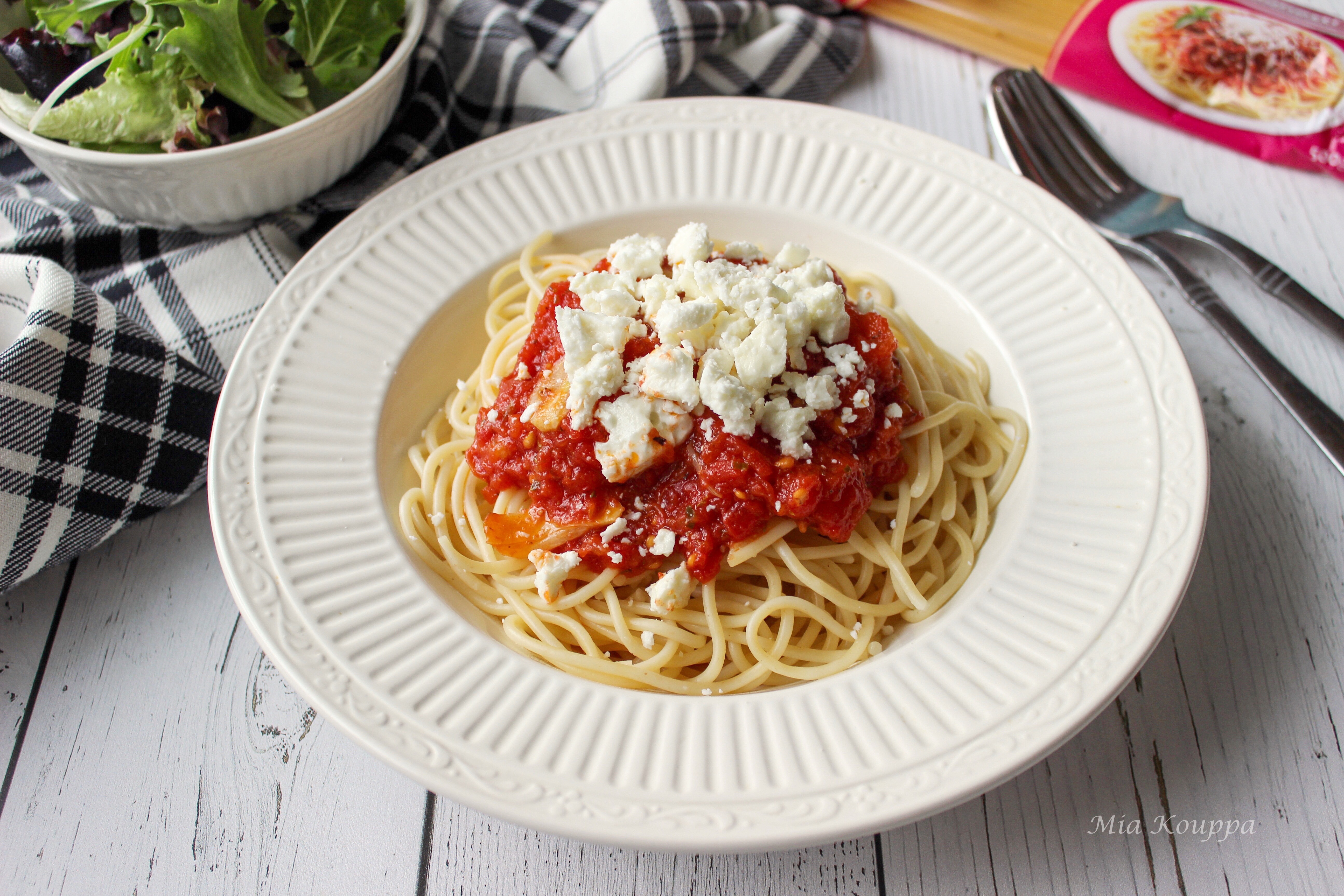 Pasta with tomato sauce and feta