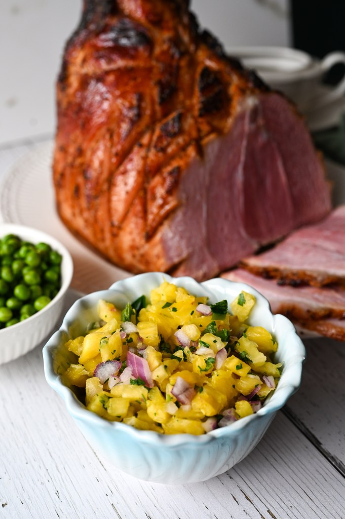 A maple, brown sugar and Dijon glazed ham served with a pineapple salsa