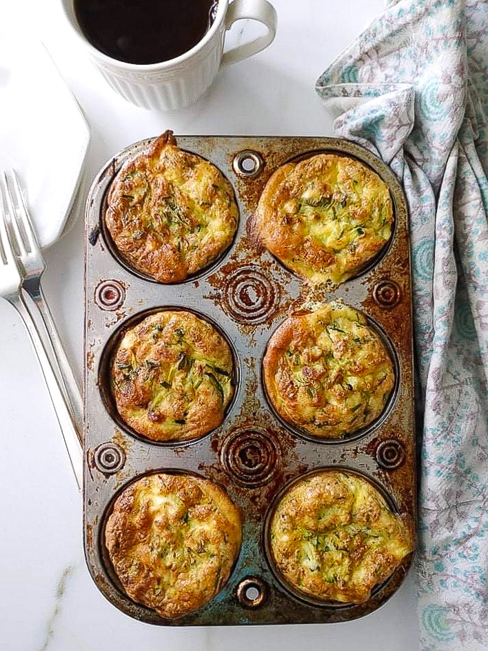 Egg zucchini muffins flavoured with cheese are the perfect make-ahead breakfast!