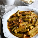 A traditional Greek side dish or main meal of okra stewed in tomato sauce, bamies latheres me domata.